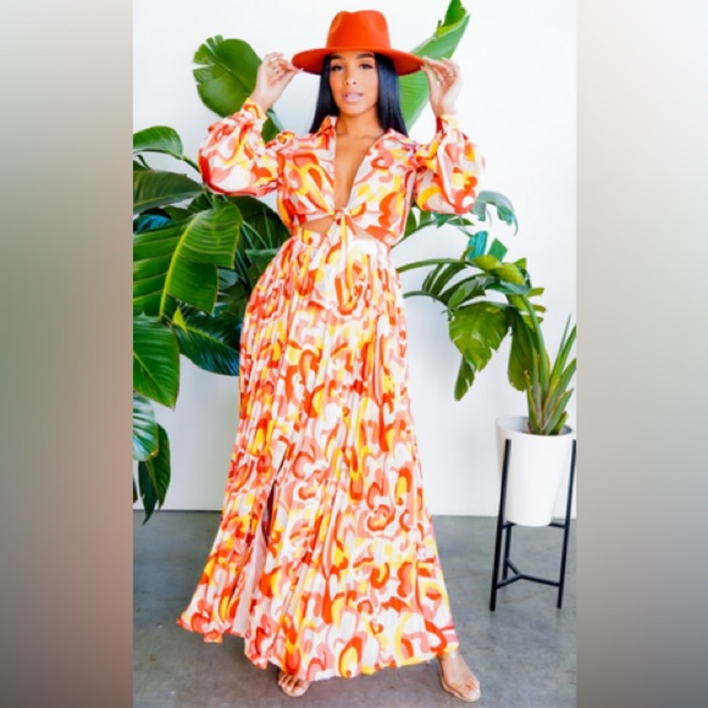 Gorgeous and chic maxi dress. New great for vacationing.